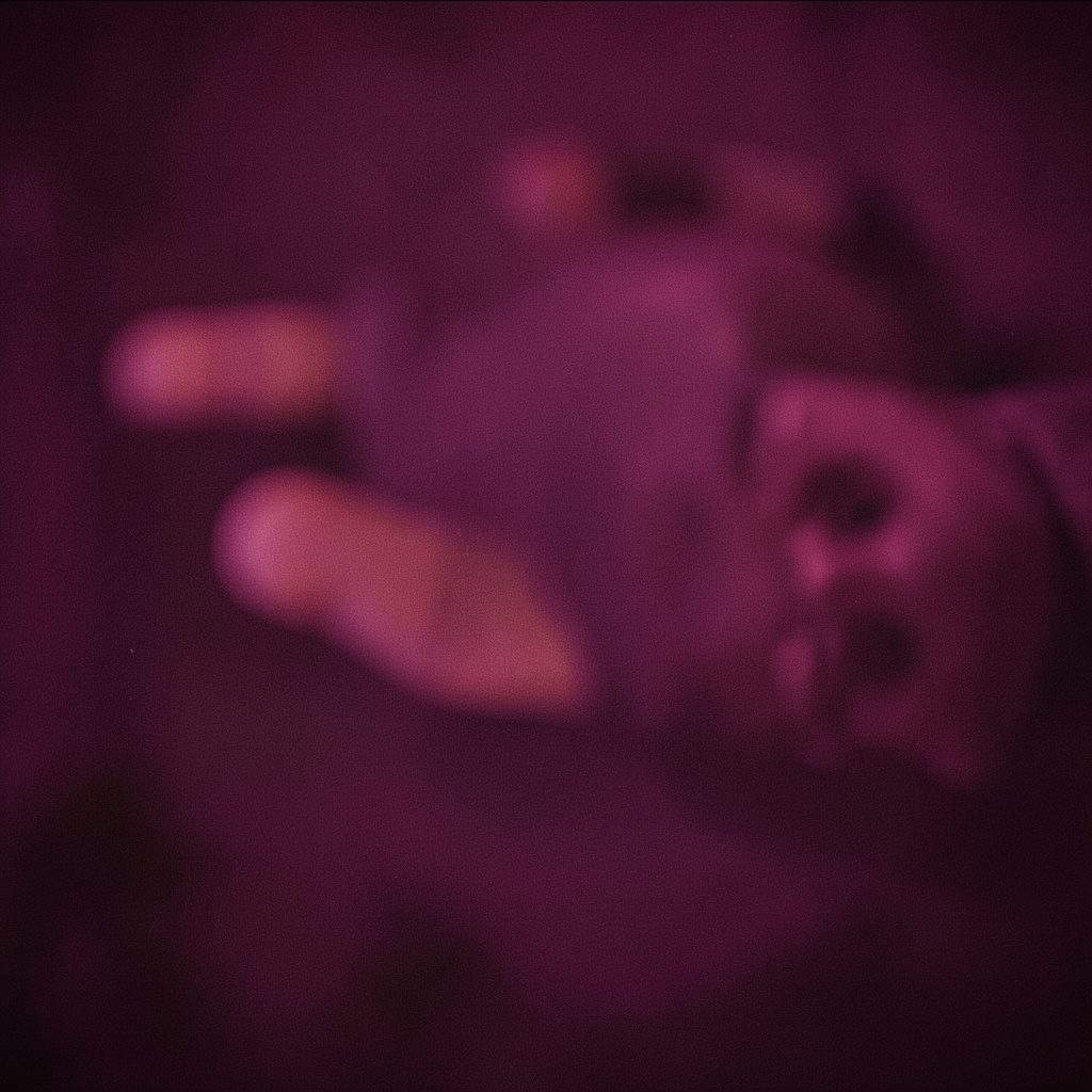 Deep purple and black abstract with soft light gradient, atmospheric and moody